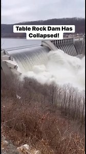 Unbelievable scenes out of Branson as a massive section of Table Rock Dam appeared to give way, sending a violent wall of water racing downstream in seconds.Boats were flipped, docks torn apart, buildings along the shoreline swallowed almost instantly as the surge pushed through the valley. Witnesses described a deep rumble before the concrete cracked and the reservoir exploded forward.Power flashes lit up the mist as structures near the river were overwhelmed. Vehicles were lifted and spun as t