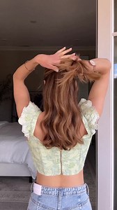 1.4K views · 25 reactions | Like an ice cream cone, minus the cals ‍♀️ Create two equal sections on the upper half of your head. Bring them together and secure with a clear elastic. On the final pull through, create a mini loop. Gently pull loop apart and push up toward your scalp. Insert a claw clip over the elastic and you’ve got yourself an easy ice cream inspired ‘do  #hair #hairtutorial #updo #hairstyles | Nichole Ciotti | Facebook