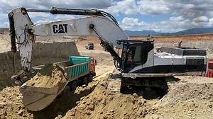 Caterpillar 375 Excavator Loading Trucks With Two Passes | Excavator drivers - sailors