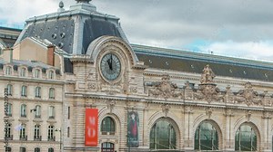 The musee d'Orsay timelapse. Museum in Paris, on the left bank of the Seine. View from Royal bridge. Musee d'Orsay has the largest collection of impressionist paintings in the world. Paris, France