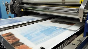 Printing process showcased in a commercial facility with vibrant colors and high-speed machinery