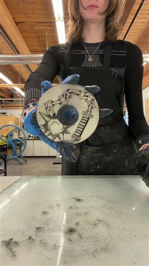 Dry point etching a CD. You can do printmaking with unconventional materials! #CD #printmaking #drypointetching #musicart #cdart