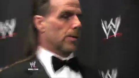 Vince McMahon presents Shawn Michaels with his 2011 WWE Hall of Fame ring.
