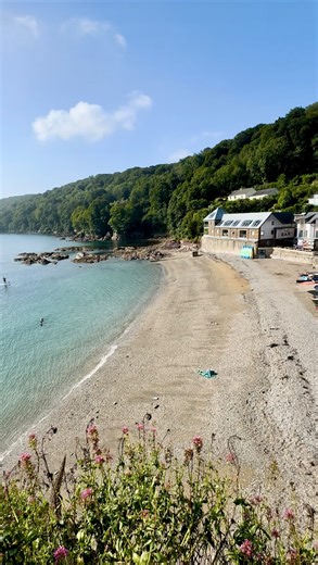 Did you guess correctly? For this week’s beach takeover we’re at Cawsand, a tiny village and beach (next to its twin Kingsand) with so much to offer. Known as Cornwall’s ‘forgotten corner’, Cawsand is an unspoilt village with a Mediterranean feel. Think pastel-toned cottages with French window shutters, bobbing boats, sparkling seas and fancy delis serving capuccinos and cruffins. At first light, wild swimmers and paddle boarders make the most of calm conditions. Then all day long, the ferry (wh