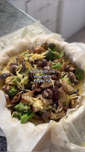 Vegetable Phyllo pie Serves 6 as a main / 12 as a side Ingredients 1 roll phyllo pastry (about 6 sheets) 1 cup salted butter, melted 400g mixed (fancy) mushrooms 300g broccoli 200g cheddar cheese, grated 150g gruyere cheese, grated 6 large eggs 1/4 cup cream Salt and pepper to taste You can add fresh chili, spring onions, garlic…. Anything really. Think of the pie filling as a frittata / omelette. Go wild. Method Defrost your phyllo pastry. Roast or pan fry your mushrooms and broccoli. In a bowl
