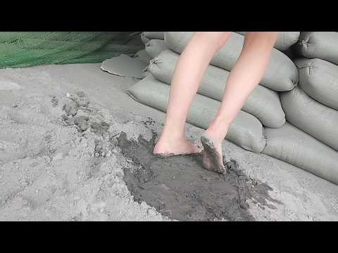 Jan walked barefoot on the construction site, and cement oozed out from between her toe crevice