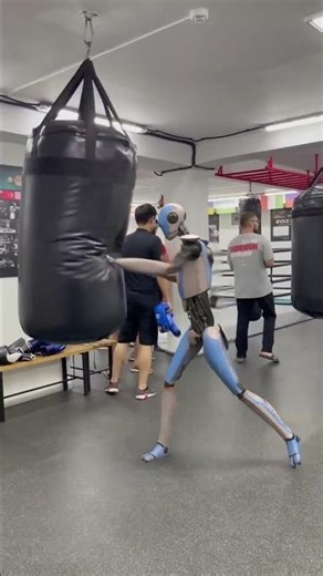 INSANE punching Power From AI Robot Punching A Bag