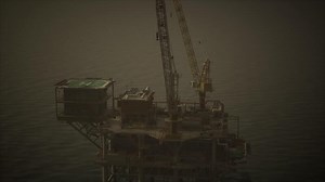 An offshore oil rig in the middle of the ocean