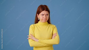 Furious woman crosses arms screaming and deeply breathing
