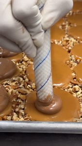 “Sooooo good. I’ve never had a better “turtle”! —Worth S., Real Customer Review See what the hype is all about… you might just find your new chocolate obsession. #chocolate #chocolatelovers #ilovechocolates #candy #candymaker #candymaking #candyshop #candystore #candyshoppe #asmr #asmrcandy #yum | Savannah's Candy Kitchen