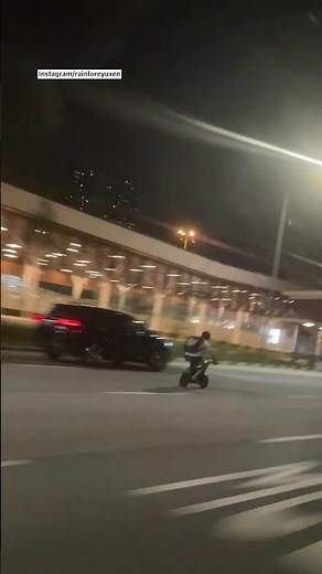 Man speeds on PMD along Keppel Road, does 'Superman' pose