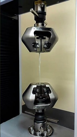 Slow motion video of a Glass fiber reinforced composite tensile test. What a brittle failure!