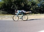 Creative: Man does 'superman' style trick to win bike race