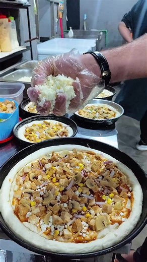 Behind the Scenes: Friends Pizza Magic! 🍕✨ Step into our kitchen and watch the magic unfold! From dough to delicious, see how our pizzas are crafted with love and flavor. Join us behind the scenes at Friends Café and experience the art of pizza-making! #FriendsPizza #PizzaMaking #BehindTheScenes #FoodieMagic #KitchenVibes