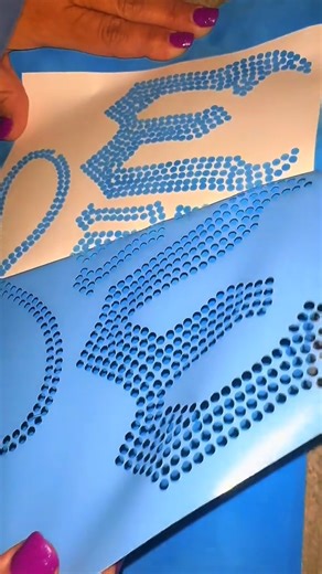 15K views · 121 reactions | Quick build from template to tee using our Wicked rhinestone design! Cut Magic Flock ✔️ Brush in ss10 (0.135") stones with clean .02" spacing ✔️ Lift with hotfix tape & press for instant Halloween sparkle ✔️ Try Twilight purple + Crystal AB for a spooky shine. Grab the Wicked design + materials at TheRhinestoneWorld.com and tag #TRWCrew so we can feature your bling | The Rhinestone World | Facebook