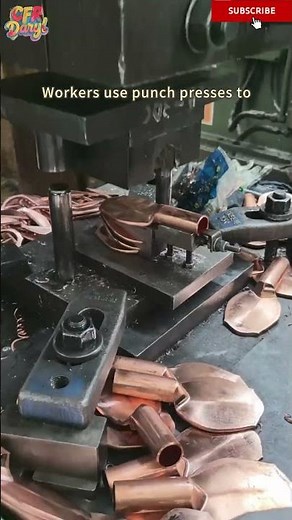 Workers use punch presses to punch copper wire terminals