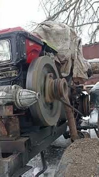 A redesigned starter for a walk-behind tractor in a robot