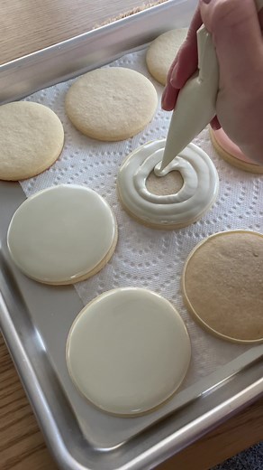 Flooding a tray of smiley face cookies #cookiedecorating #cookieartist #edibleart #cookielover #sugarcookies #redpathsugar #sosatisfying #bakingtiktok