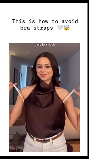 world 🌎🌍🌍 on Instagram: "The post features a 14-second tutorial video by @arina_ayunda showing a bra hack: loop both straps over the head first, press cups down, thread arms through sides, then cross straps behind the neck to hide them under halter or off-shoulder tops, achieving 3.7 million views and 15,000 likes in two days. User reactions mix amusement and skepticism, with top replies joking about strangulation risks or discomfort from bunching fabric, while others suggest simpler fixes li