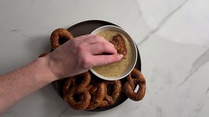 Our honey mustard dip is a salty soft pretzel's best friend