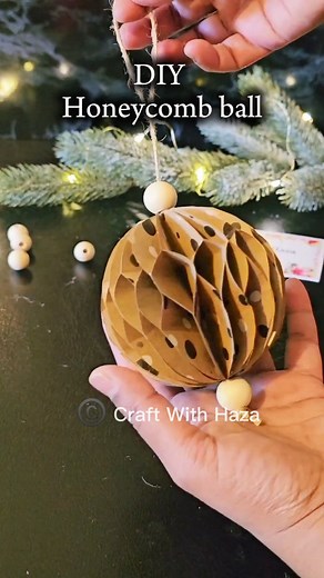 DIY Christmas Ornament | How to Make a Honeycomb Ball . . . . #diy #diyornaments #christmasornaments #craft #diycrafts #papercraft #handmade #tutorial #stepbysteptutorial #holidaycrafts #christmascraft #christmasdecor #honeycombball #festive #festivedecor #festivecrafts #easycrafts #craftsforkids #kidscraft #creativediy #creative #instareels #fbreels #viralreels | Craft With Haza