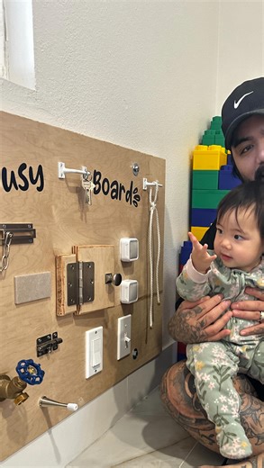joey on Instagram: "Busy boards were originally inspired by Montessori principles, which say kids learn best when their hands are busy and their brains get to explore real-world objects. I wish I had this for my first daughter🥲. I’ll post on my story in a week to let you guys know which items on the board were her favorite! #girldad #diy #baby #busyboard #parenting"