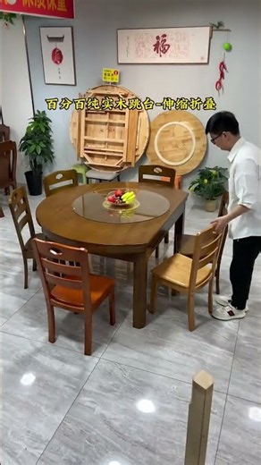 extendable wooden round dining table and matching chairs set featuring a central glass Lazy Susan.