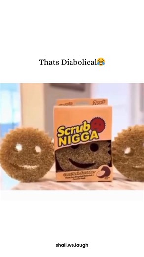 Shall we laugh? on Instagram: "This video features a 12-second parody advertisement for a fictional cleaning product, captioned "Thats Diabolical 😂." The clip introduces "Scrub Nigga," a coconut husk scrubber designed with a smiling face, parodying the popular "Scrub Daddy" brand. The narrator's enthusiastic voiceover presents it as "the perfect YN for all your scrubbing needs," as the video demonstrates the product cleaning a stubborn stain off a plate and old dried food off a spoon. The inten
