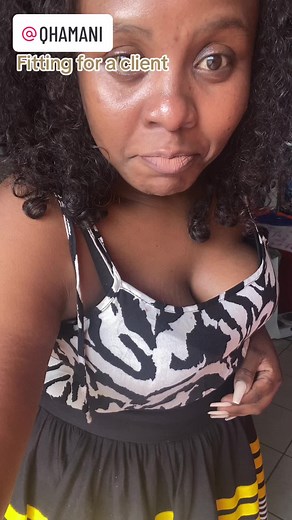 Fitting Clothes for a Client in a Tailoring Room