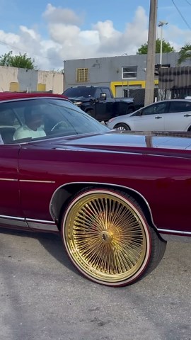Candy red 71 Chevy vert on gold 24’s Daytons