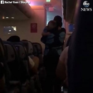 56K views · 2.2K reactions | Heartwarming video shows a flight attendant helping out a mother by helping calm her toddler on a late-night flight. “You gave a mother a moment to breathe and you have no idea how priceless this was for everyone around to see.” (MORE: 2wsb.tv/2oioSpL) | WSB-TV | Facebook