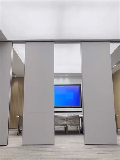 Full automatic Operable Wall From Neuwall Partition Wall，Full Automatic Operable Wall by Neuwall is an electrically powered partition system designed for effortlessly dividing large spaces. It can be operated via remote control or push-button, allowing rooms to be quickly reconfigured for different functions. Key features include: Electric Operation:​ The wall panels move and lock into position automatically with an electric motor drive, eliminating the need for manual effort . Excellent Soundpr