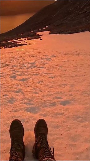 Nothing special — just quietly sliding down the mountain on my butt, watching the midnight sun.