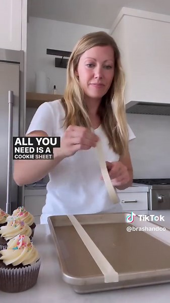 Transport cupcakes the easy way! All you need is masking tape and a cookie sheet! #worksmarternotharder #cupcakehack #cupcakes #cupcakesoftiktok #cupcakes #momhacks