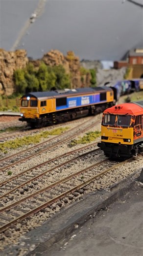 Realtrack class 156 & Bachmann class 66 with a short rake of drax wagons #loftmodelrailway #modeltrains #modelrailway #trains #00gaugemodelrailway #bachmann #class66 #class156 | North West Trains