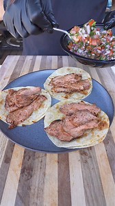 Iberico pork tacos. Served on double decker cheese stuffed tortillas and topped with a chipotle cilantro crema. These were SO GOOD! Packed full of flavor and pretty easy to make too! #grillinwithdad #bbq #grill #tacos #recipe #foodie #delicious #easyrecipe #taconight #eeeeats #nomnom | Grilling with dad