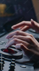 The editor uses digital color grading control panel. Colorist makes video or photo color correction on computer in studio. Tablet with footage and program interface with RGB color wheels at background