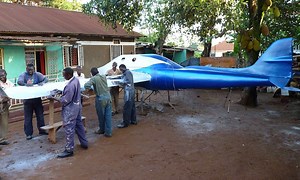 Not exactly Nasa! Ugandan space chief builds test craft in his mother's muddy back yard (and you'll never believe his plans for zero gravity training)