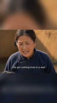 The girl released a hundred fishes into the well in front of her house.
