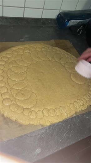 Decorating Golden-Brown Bread with Unique Patterns