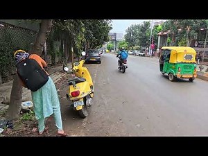 Woman scooty revving.