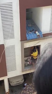Brave men save a baby. The viral video on social media shows a baby precariously hanging onto a ledge. Netizens are wondering how it got there and where the baby's parents are? The incident happened in an apartment complex in Chennai. | India Community Digest