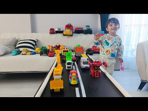 Cardboard house toys lighted ambulance monster truck tractor hotweels racing lighted race cars