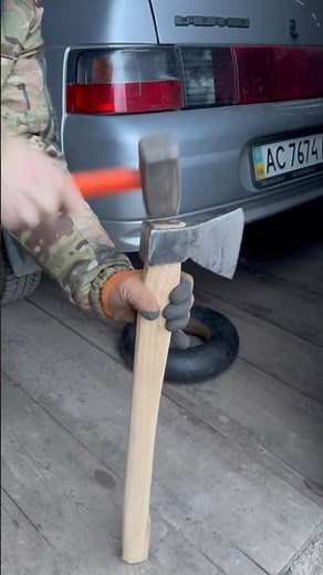 Securing the Axe Head: Wedge Installation Process