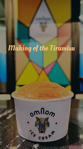 The Tiramisu is back and here you can see the delicious layers of sponge cake,coffee Marsala syrup, creamy soft serve vanilla ice cream and coffee chocolate ganache being assembled by yours truly.I will be having one of these every day for the foreseeable future 🫣 | Omnom Chocolate