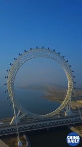 #DroneChina Standing 465 feet (142 meters) tall, the giant ferris wheel in Weifang, E China’s Shandong province, is the world's largest spokeless Ferris wheel. | China Daily