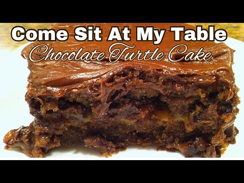 Chocolate Turtle Cake- A Rich Cake Filled with Caramel, Pecans and Chocolate Chips!