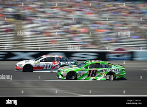 Danica Patrick (10) and Kyle Busch race down the front stretch during the Monster Energy NASCAR Cup Series O'Reilly Auto Parts 500 race at Texas Motor Speedway, Sunday, April 9, 2017, in Fort Worth, Tx. (AP Photo/NKP, Logan Whitton) MANDATORY CREDIT Stock Photo - Alamy