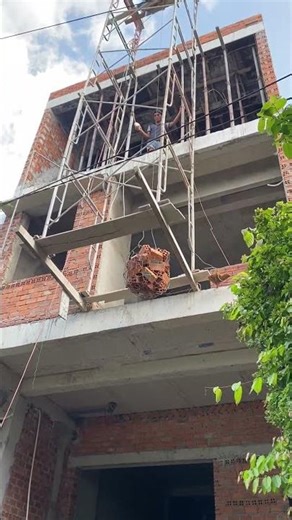 This is how people transport bricks for building a house