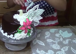 Elegant Bird Cake Design in Chocolate By: The Art of Frosting | MetDaan Cakes